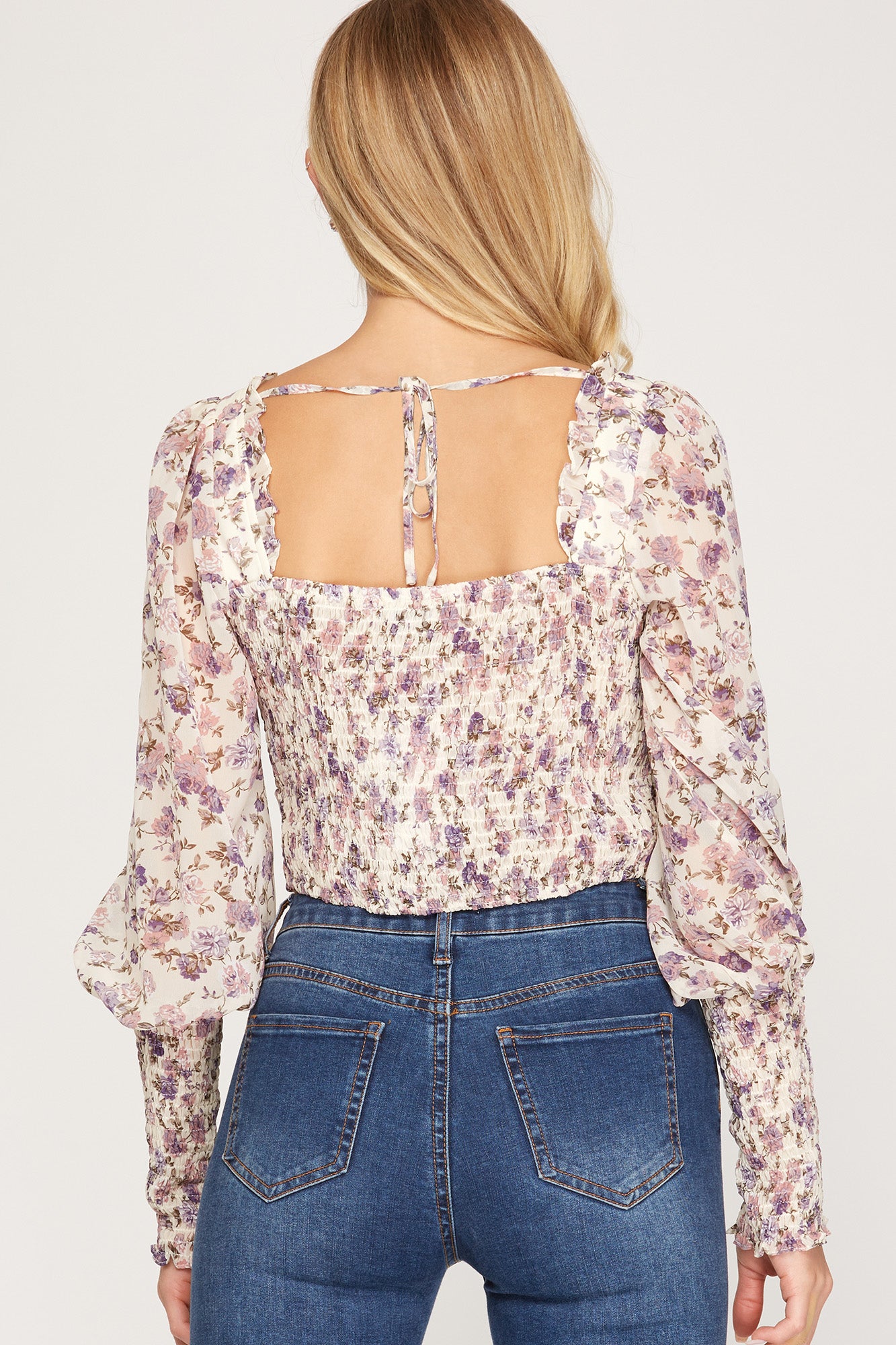 HOPELESS ROMANTIC SMOCKED LONG SLEEVE WOVEN PRINT SHIRRED TOP WITH FRONT TIE DETAIL